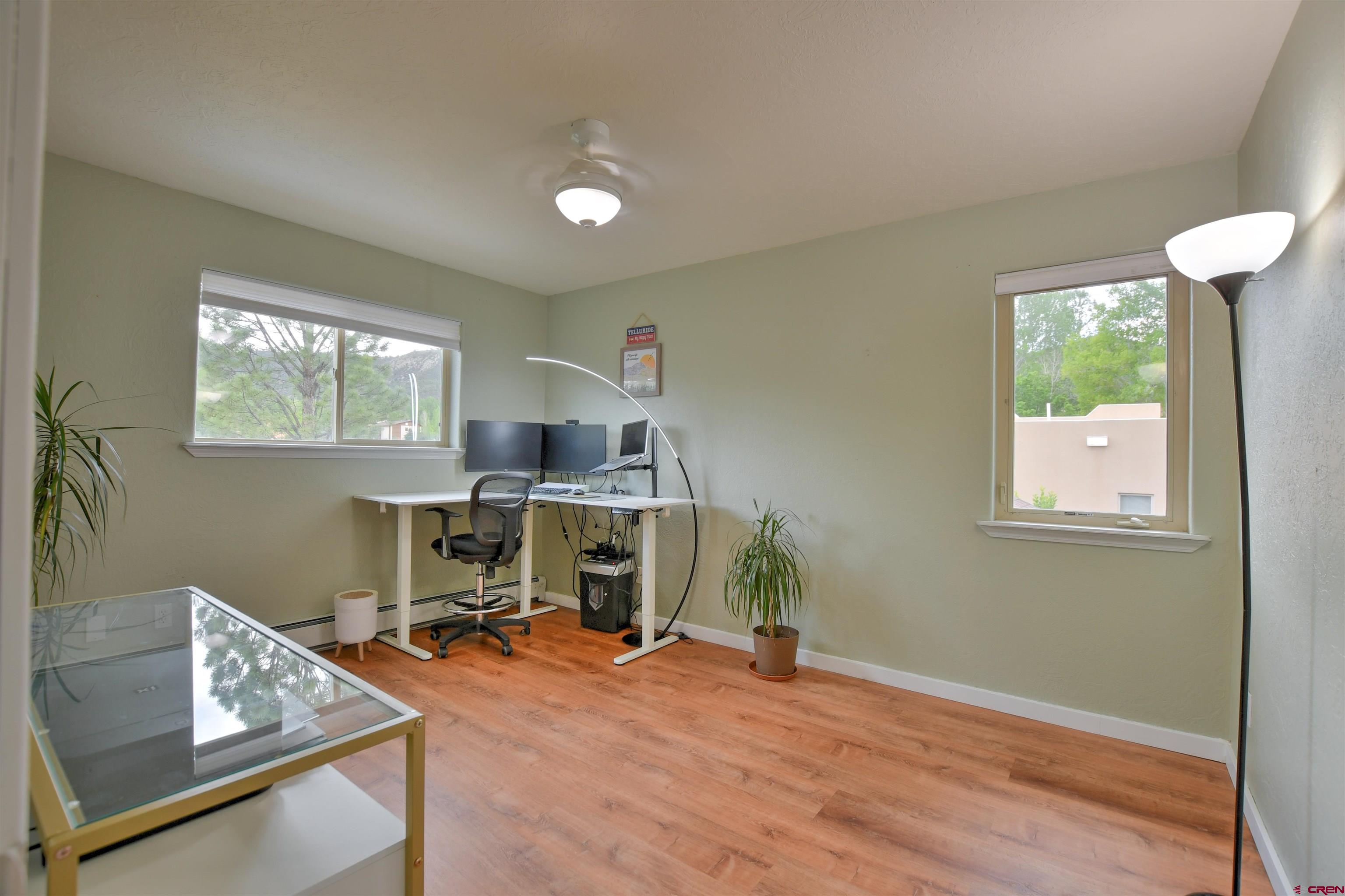 602 Chipeta Drive Ridgway, CO 81432 - Photo 24 of 41 a workspace with furniture and a window