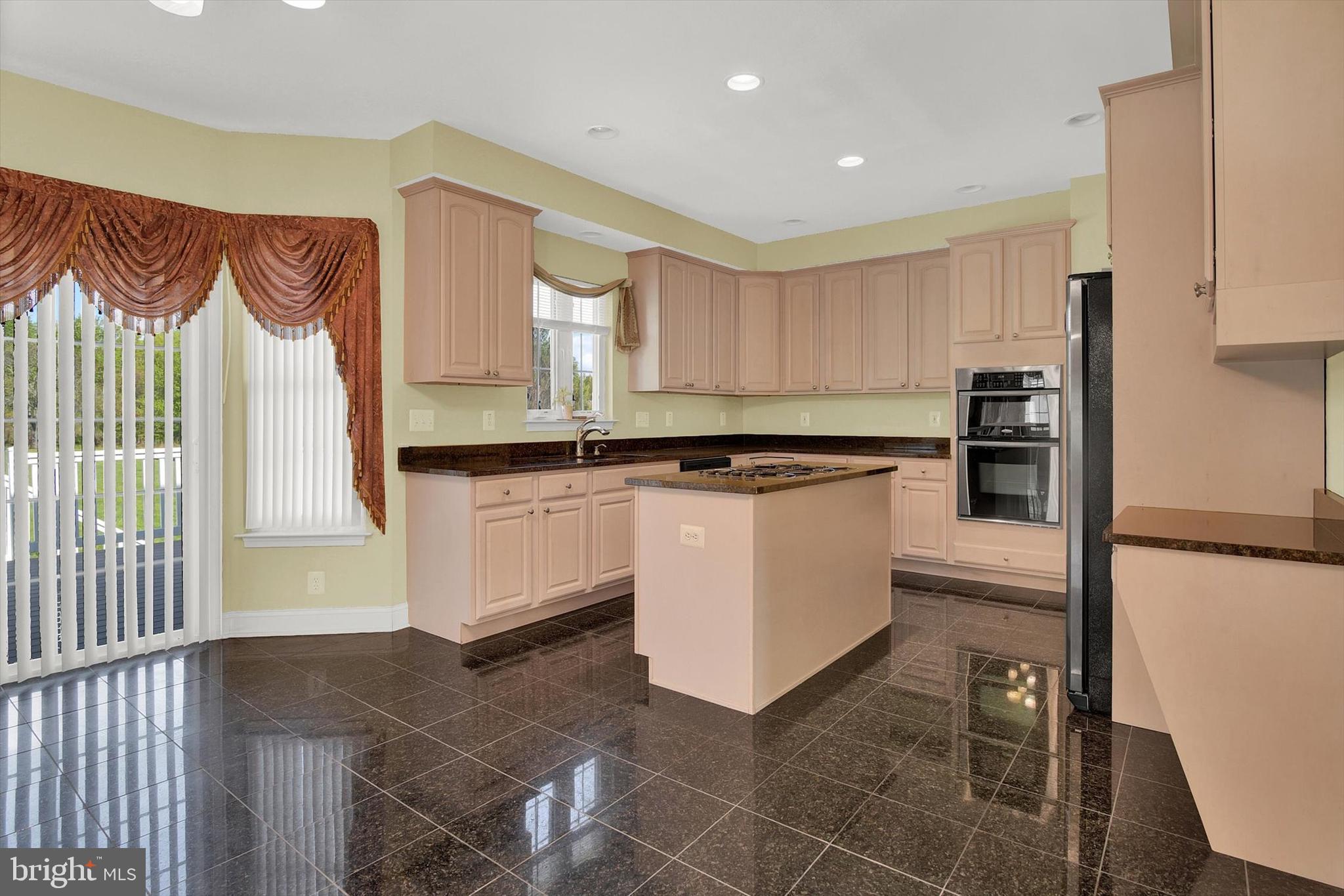 9023 Hines Road Parkville, MD 21234 - Photo 9 of 36 Spacious kitchen with Marble throughout