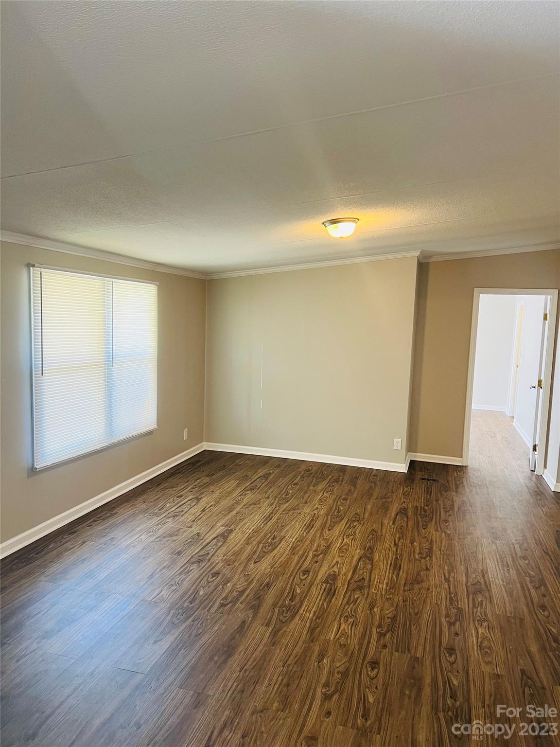 5310 Fallston Road Lawndale, NC 28090 - Photo 12 of 20 wooden floor in an empty room with a window