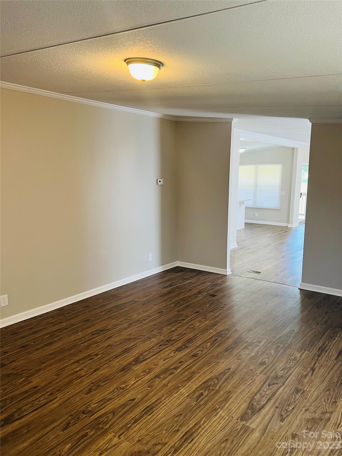 5310 Fallston Road Lawndale, NC 28090 - Photo 13 of 20 a view of an empty room with wooden floor and closet