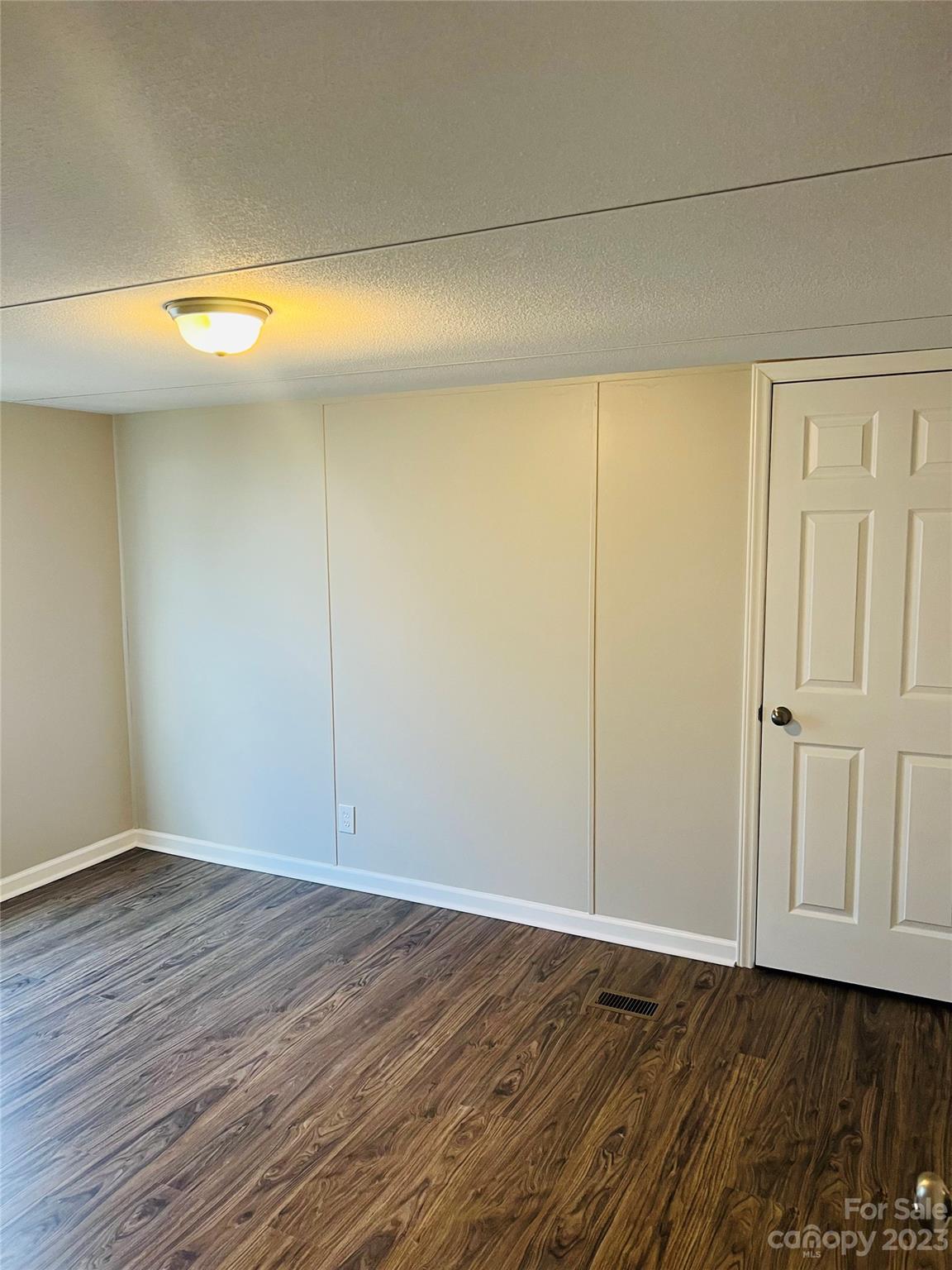 5310 Fallston Road Lawndale, NC 28090 - Photo 14 of 20 a view of an empty room with wooden floor