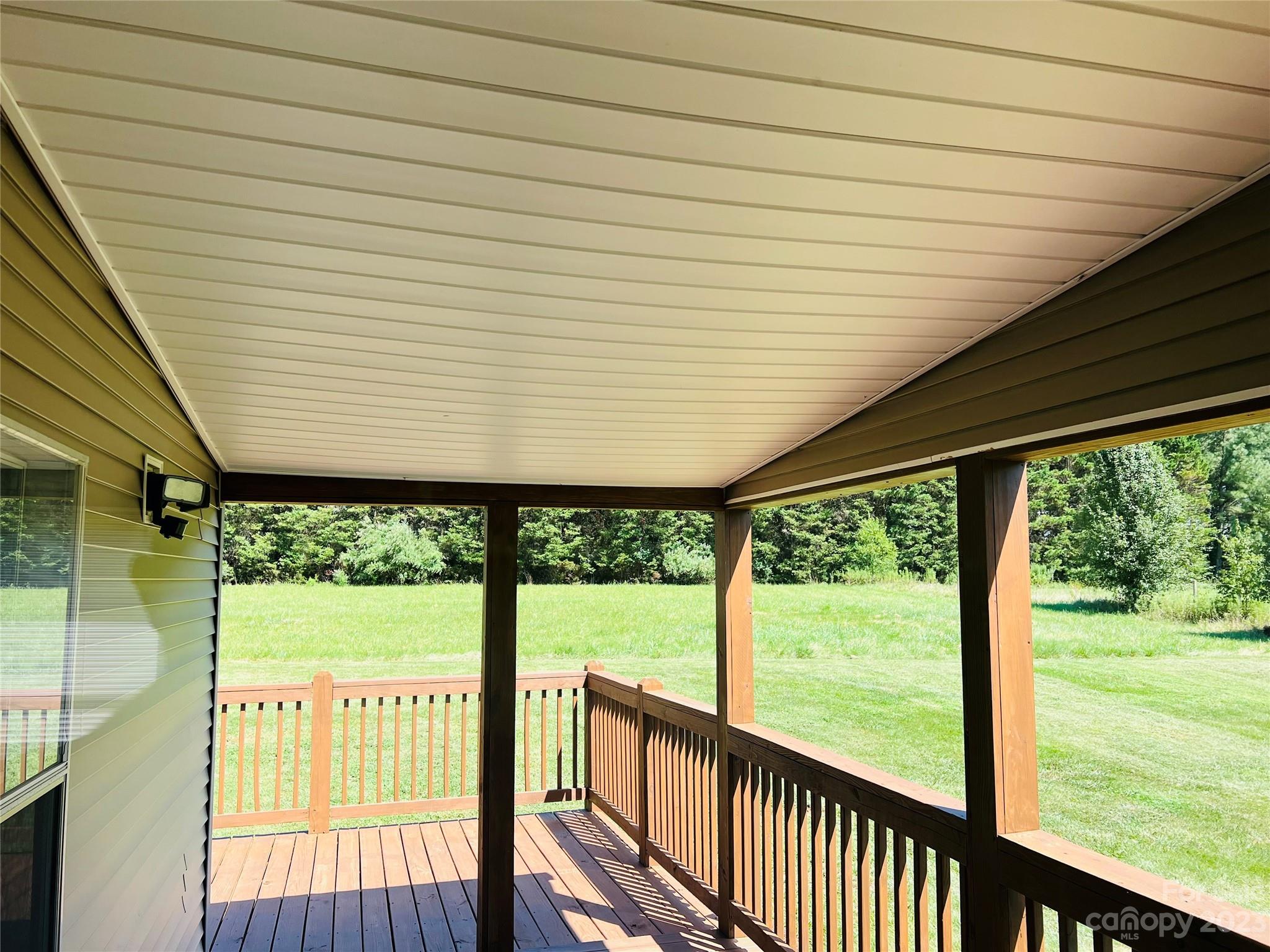 5310 Fallston Road Lawndale, NC 28090 - Photo 5 of 20 a view of a porch with wooden floor and outdoor space