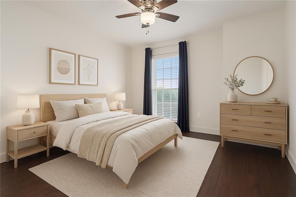 199 14th Street Northeast, Unit 704 Atlanta, GA 30309 - Photo 15 of 34 a bedroom with a bed a chandelier and a window