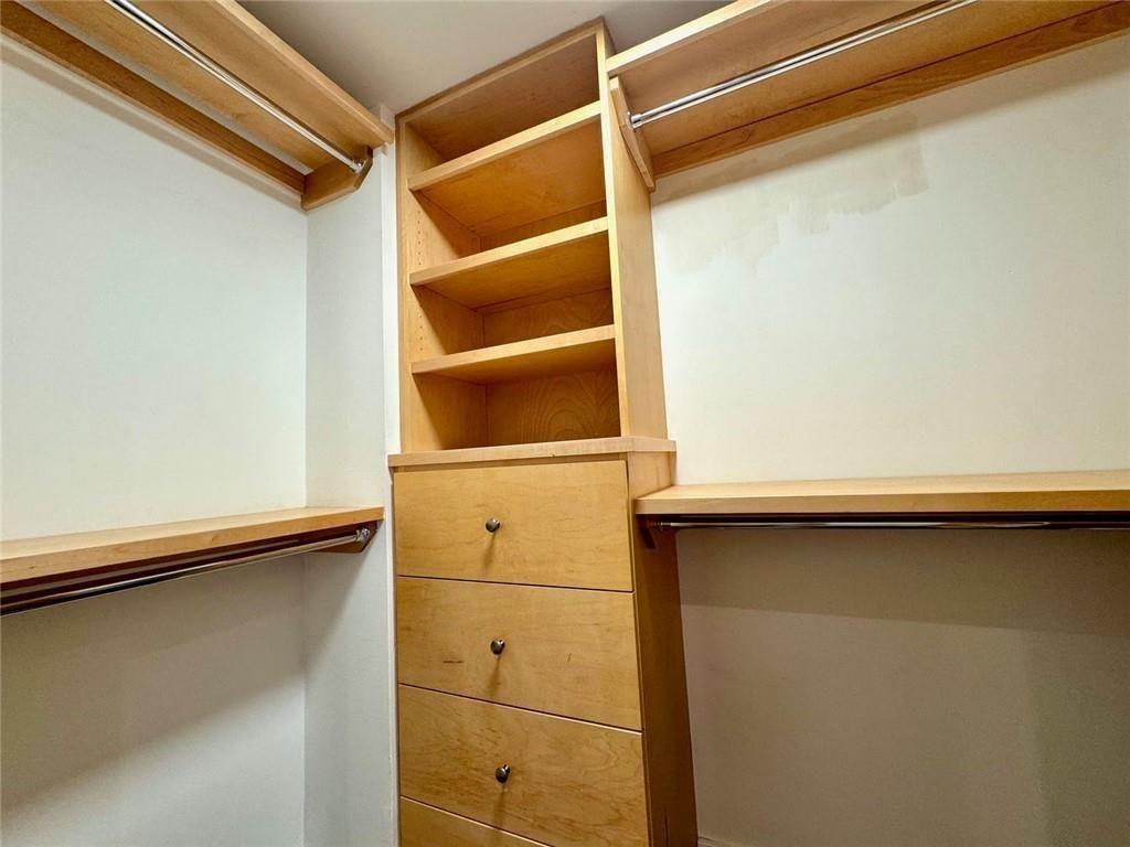 199 14th Street Northeast, Unit 704 Atlanta, GA 30309 - Photo 20 of 34 a view of walk in closet