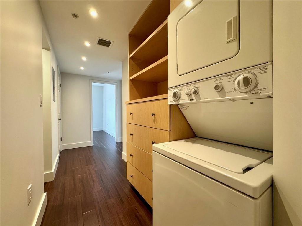 199 14th Street Northeast, Unit 704 Atlanta, GA 30309 - Photo 21 of 34 a utility room with dryer and washer