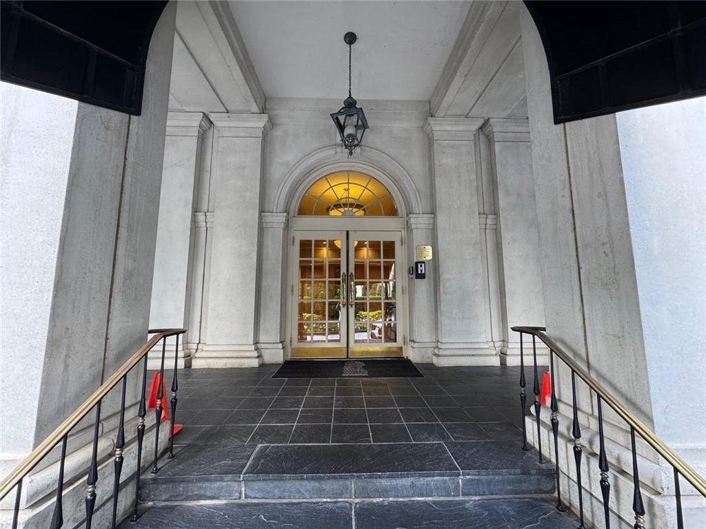 199 14th Street Northeast, Unit 704 Atlanta, GA 30309 - Photo 3 of 34 a view of an entryway with wooden floor