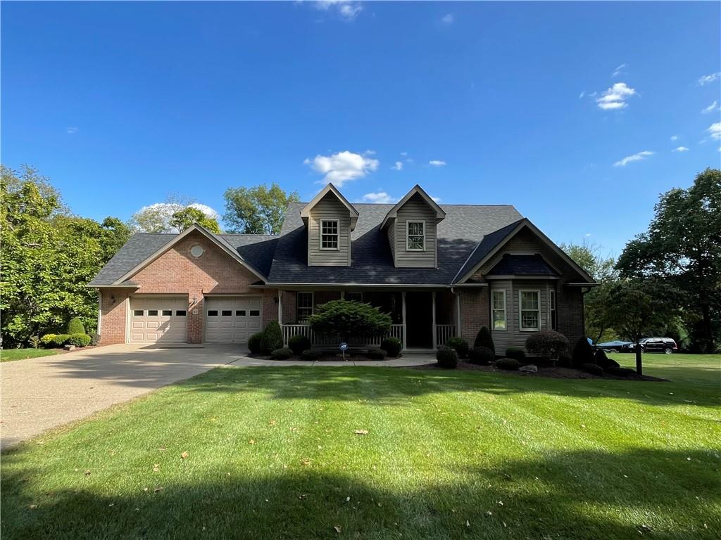 40 Fitzwilliams Road Washington, PA 15301 - Photo 1 of 23 a front view of a house with a yard