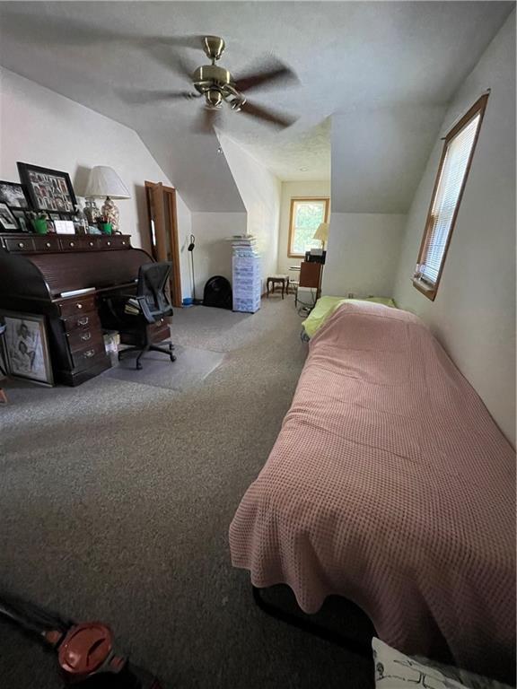 40 Fitzwilliams Road Washington, PA 15301 - Photo 17 of 23 a bed room with furniture and a chandelier