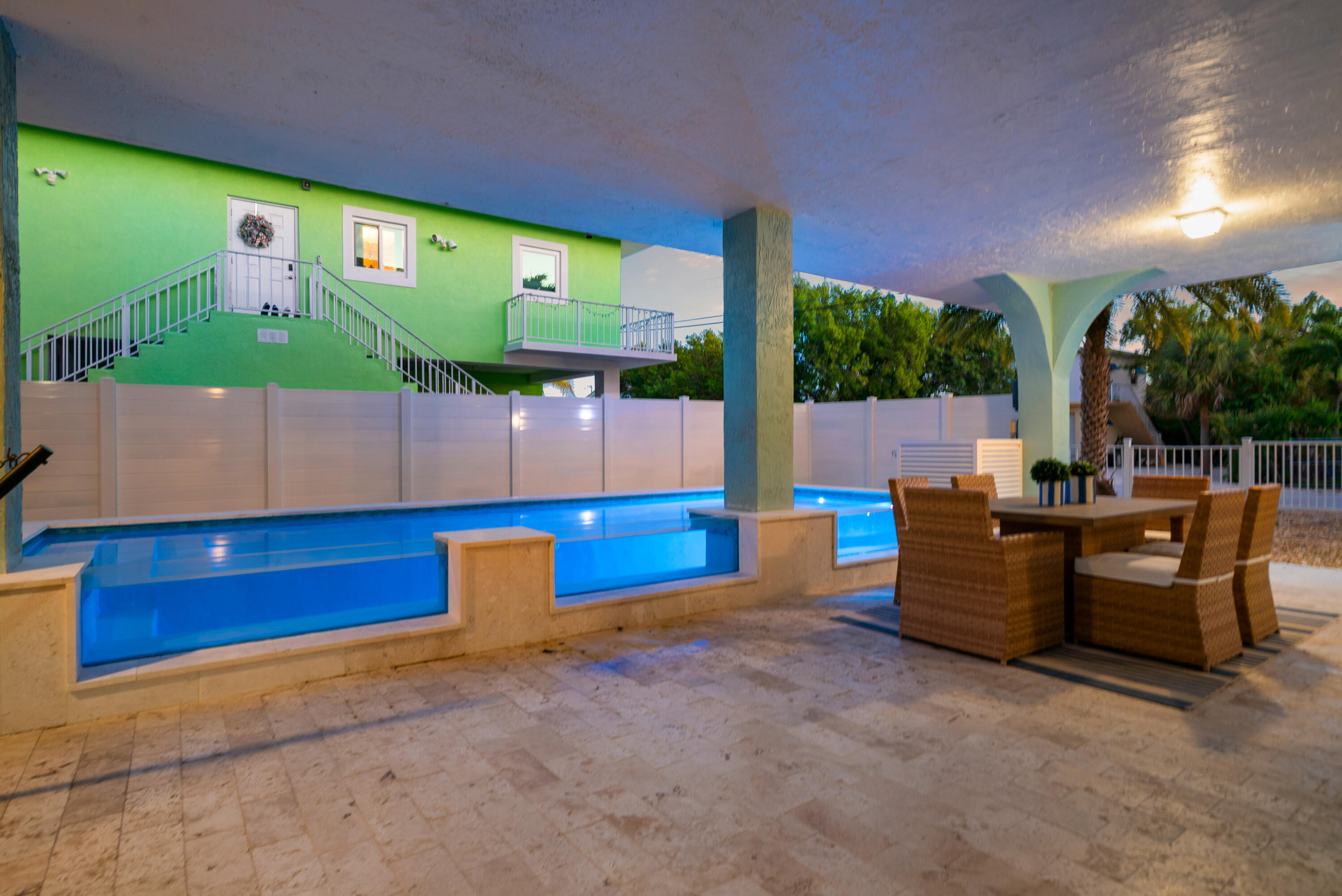 127 Peace Avenue Key Largo, FL 33070 - Photo 23 of 56 a view of a patio with couches and table