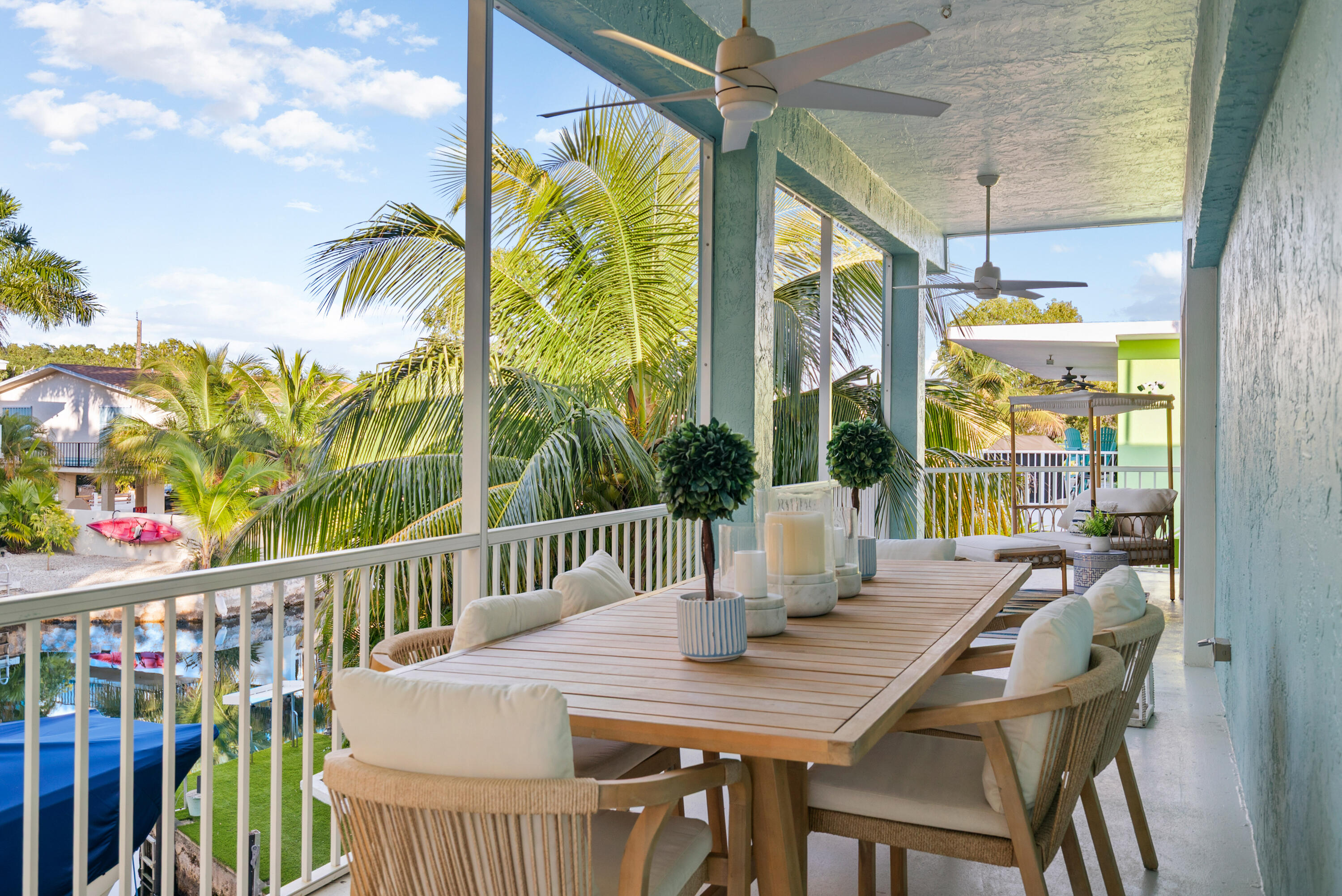 127 Peace Avenue Key Largo, FL 33070 - Photo 24 of 56 a view of a dining room with furniture window and outside view