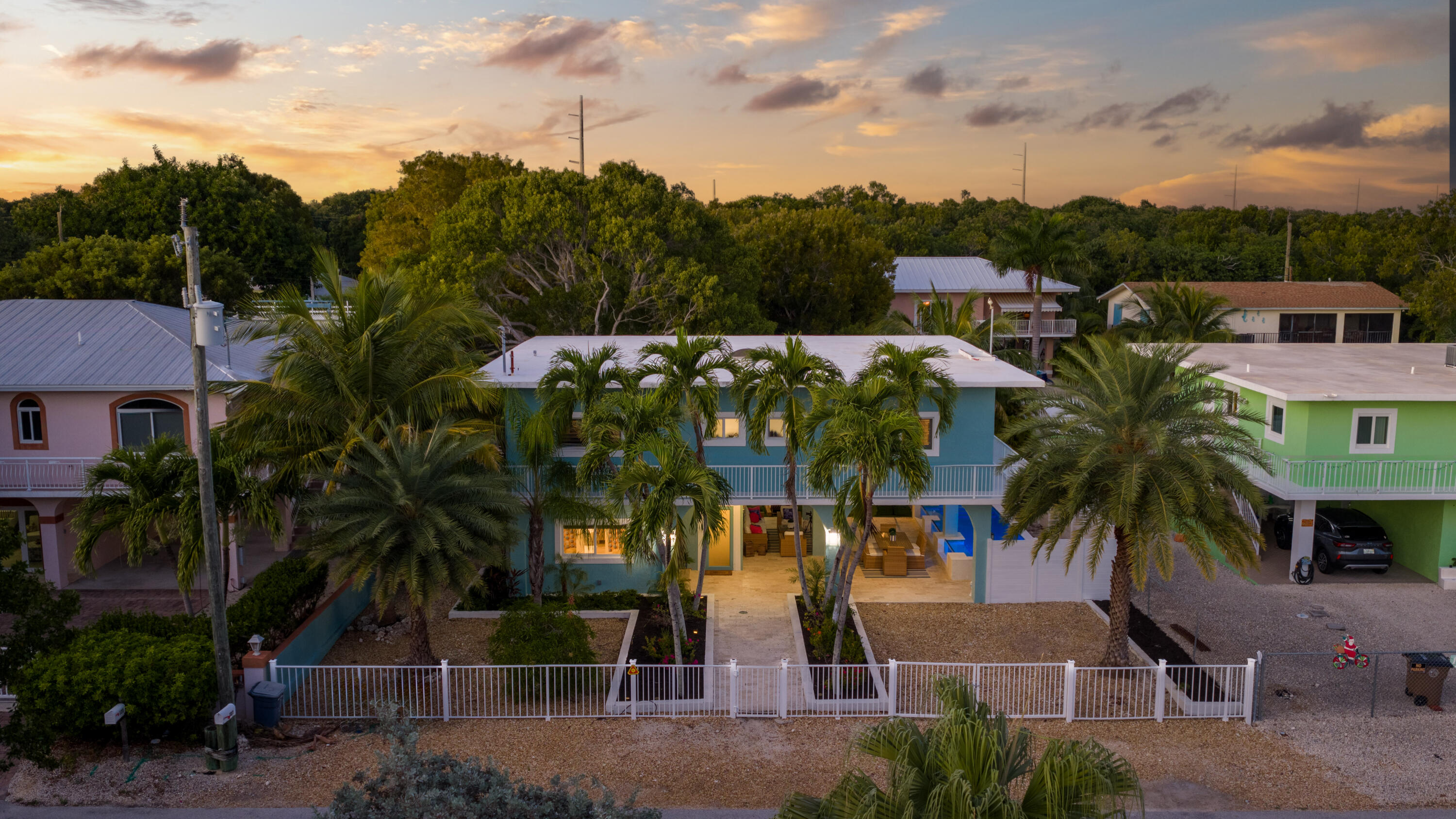 127 Peace Avenue Key Largo, FL 33070 - Photo 41 of 56 a view of multiple houses with a yard
