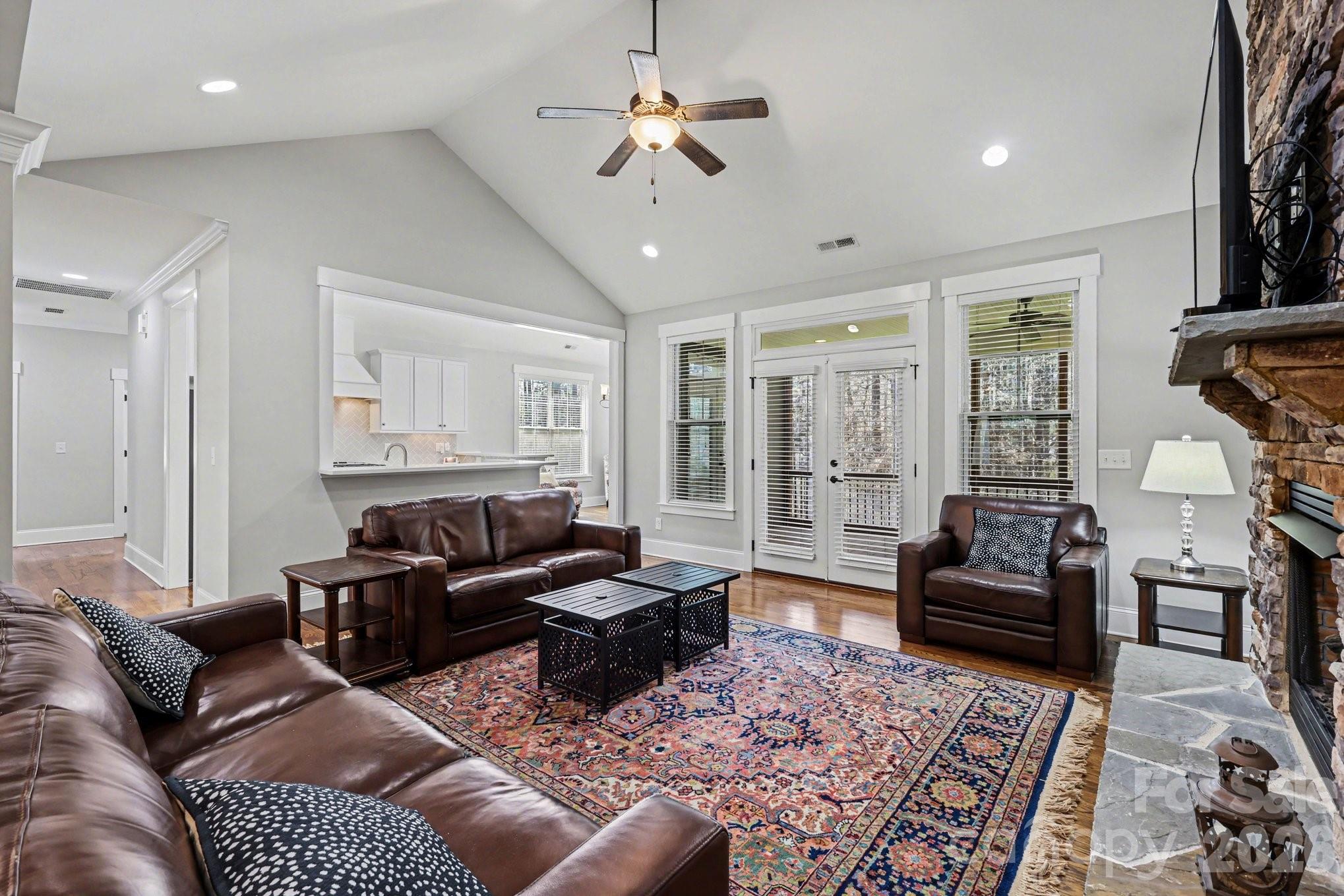 4193 Persimmon Road Lancaster, SC 29720 - Photo 11 of 42 a living room with furniture ceiling fan and a rug