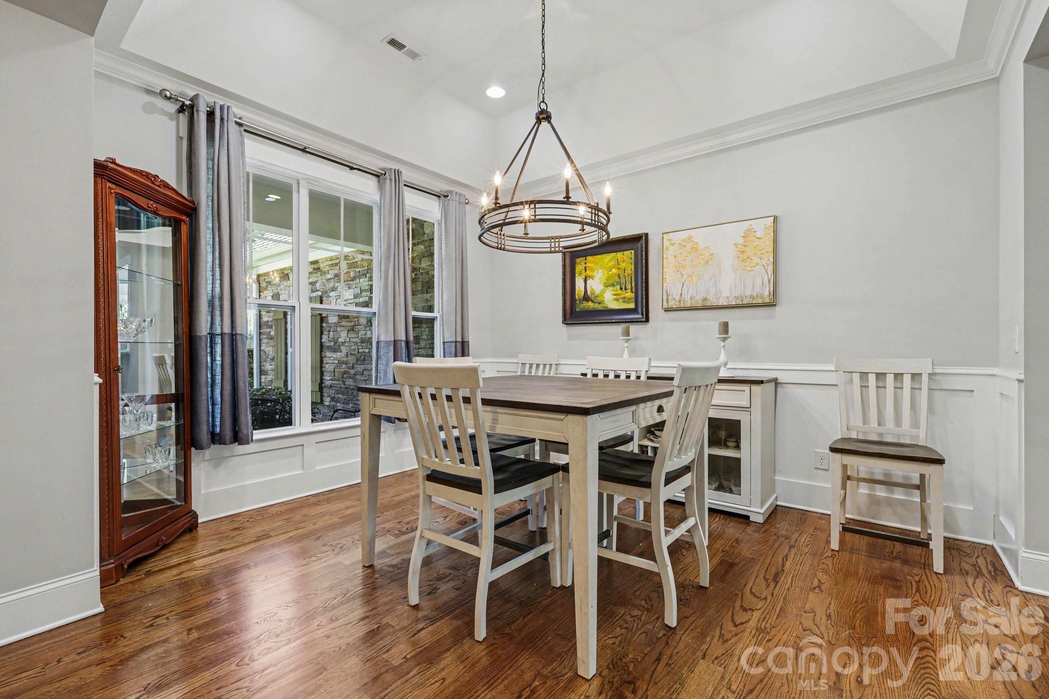 4193 Persimmon Road Lancaster, SC 29720 - Photo 13 of 42 a view of a dining room with furniture and wooden floor