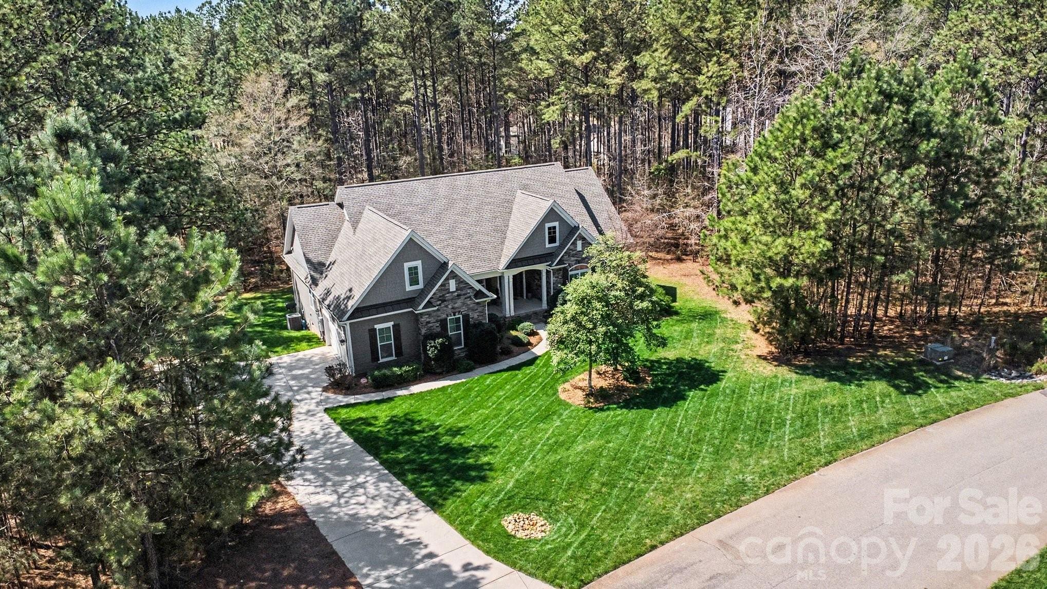 4193 Persimmon Road Lancaster, SC 29720 - Photo 2 of 47 a view of a garden with an buildings