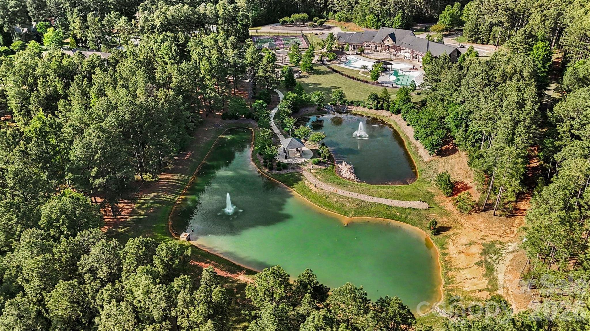 4193 Persimmon Road Lancaster, SC 29720 - Photo 34 of 47 an aerial view of residential house with outdoor space and swimming pool