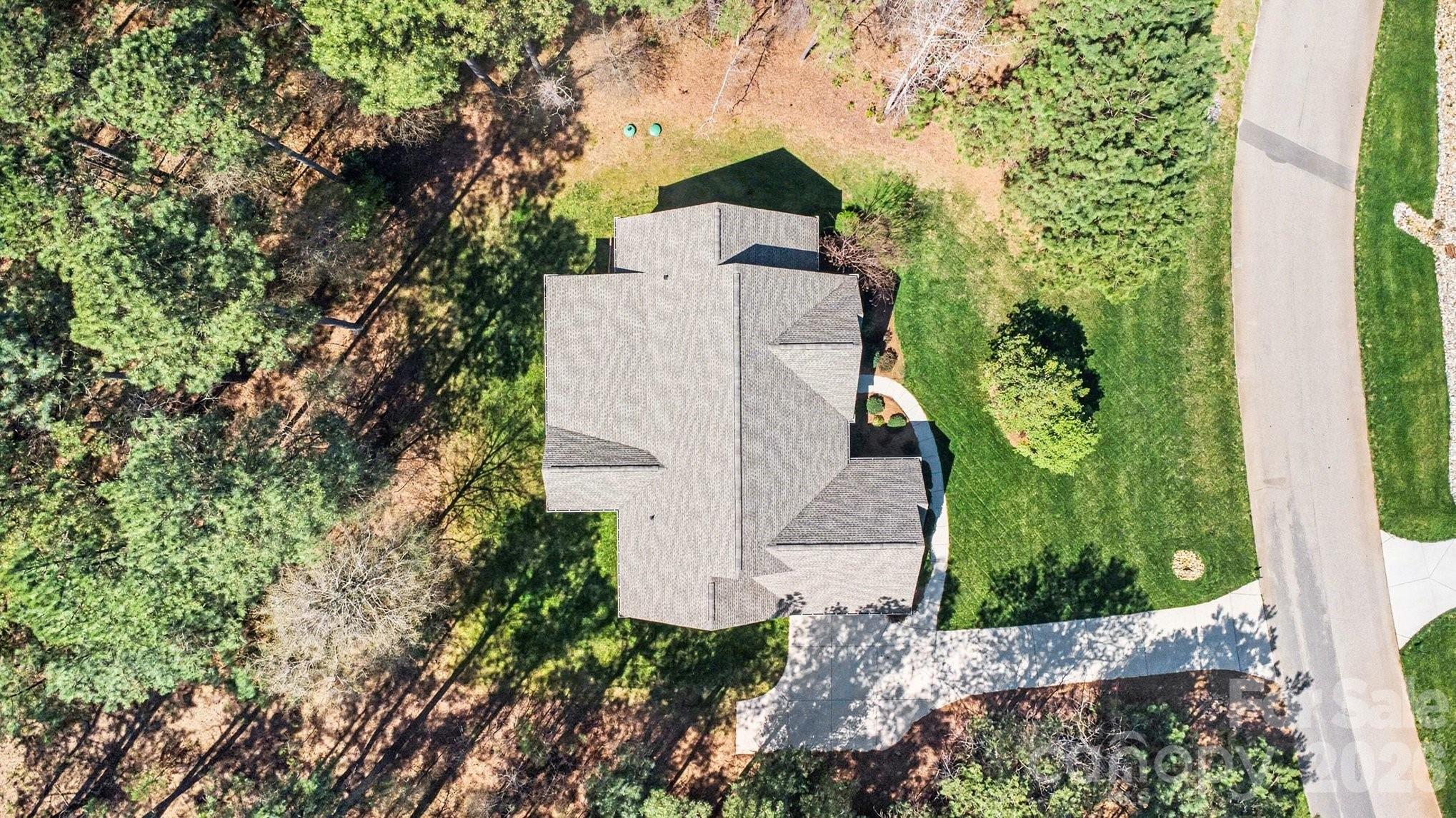 4193 Persimmon Road Lancaster, SC 29720 - Photo 37 of 42 an aerial view of a house with a yard and large trees