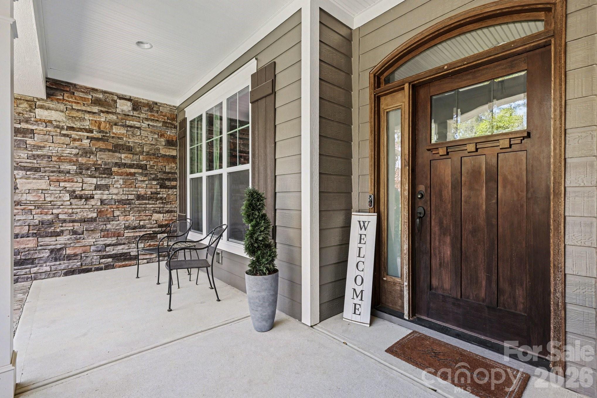 4193 Persimmon Road Lancaster, SC 29720 - Photo 4 of 42 a view of patio with a table and chairs and potted plants