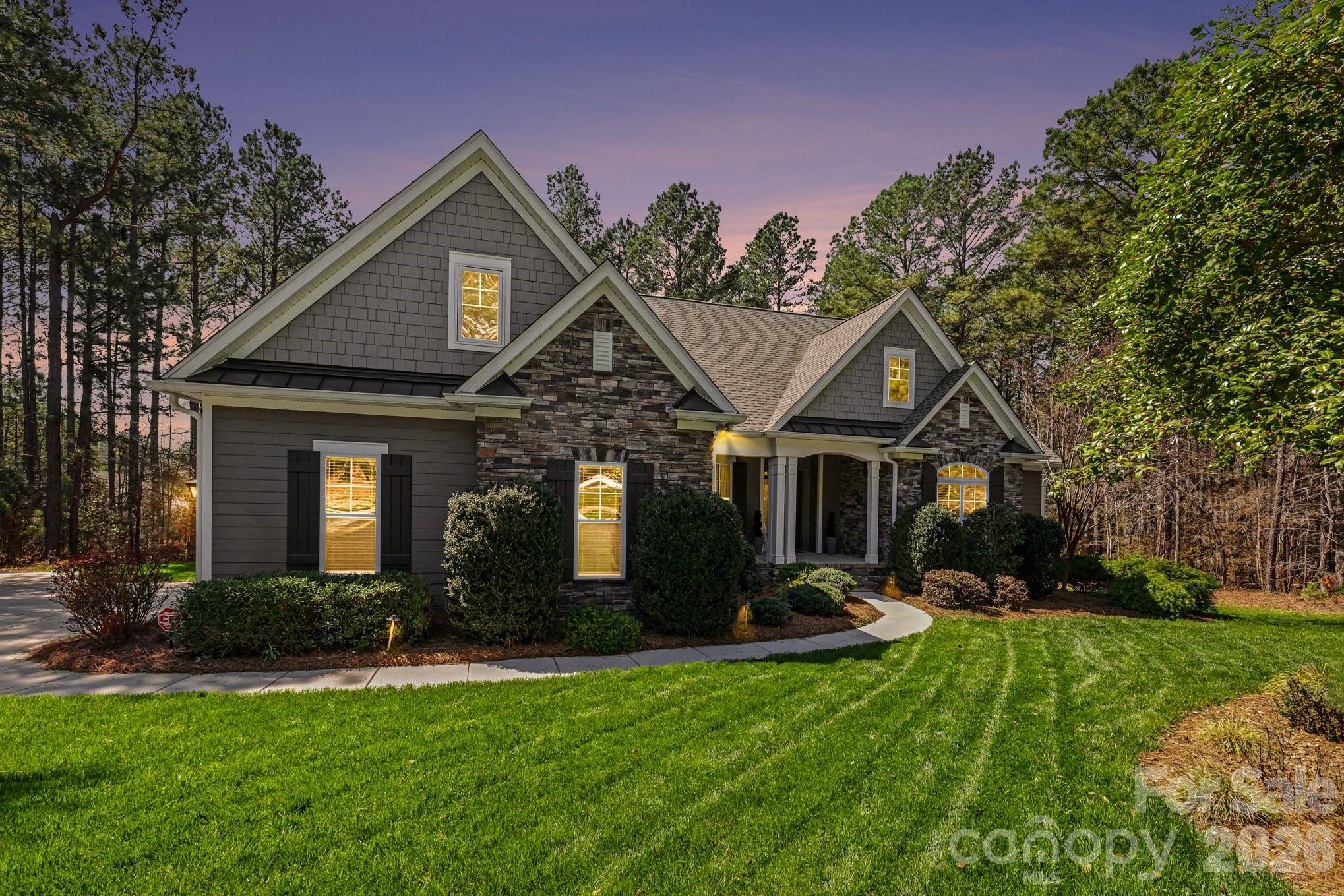 4193 Persimmon Road Lancaster, SC 29720 - Photo 41 of 47 a front view of a house with a yard