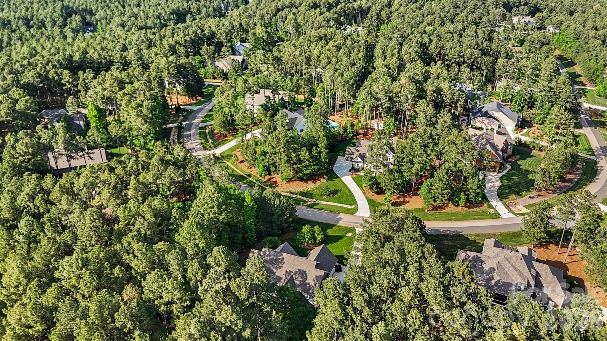 4193 Persimmon Road Lancaster, SC 29720 - Photo 47 of 47 an aerial view of a house with a yard and trees