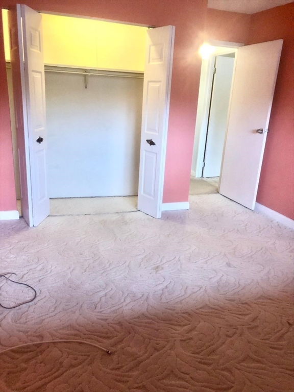 146 Marble Street, Unit 204 Stoneham, MA 02180 - Photo 17 of 21 a view of an empty room