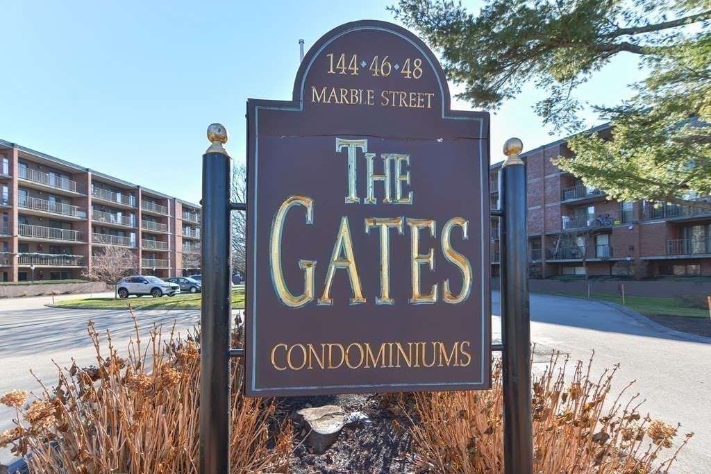 146 Marble Street, Unit 204 Stoneham, MA 02180 - Photo 19 of 21 a sign on the side of a building