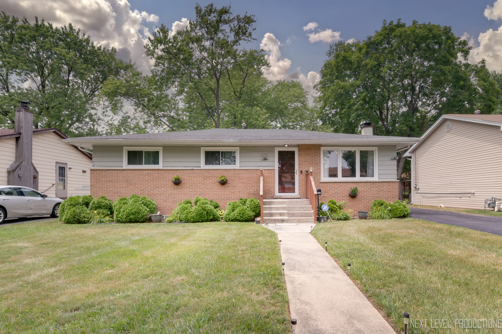 22816 Ridgeway Avenue Richton Park, IL 60471 - Photo 1 of 25 a front view of a house with a yard