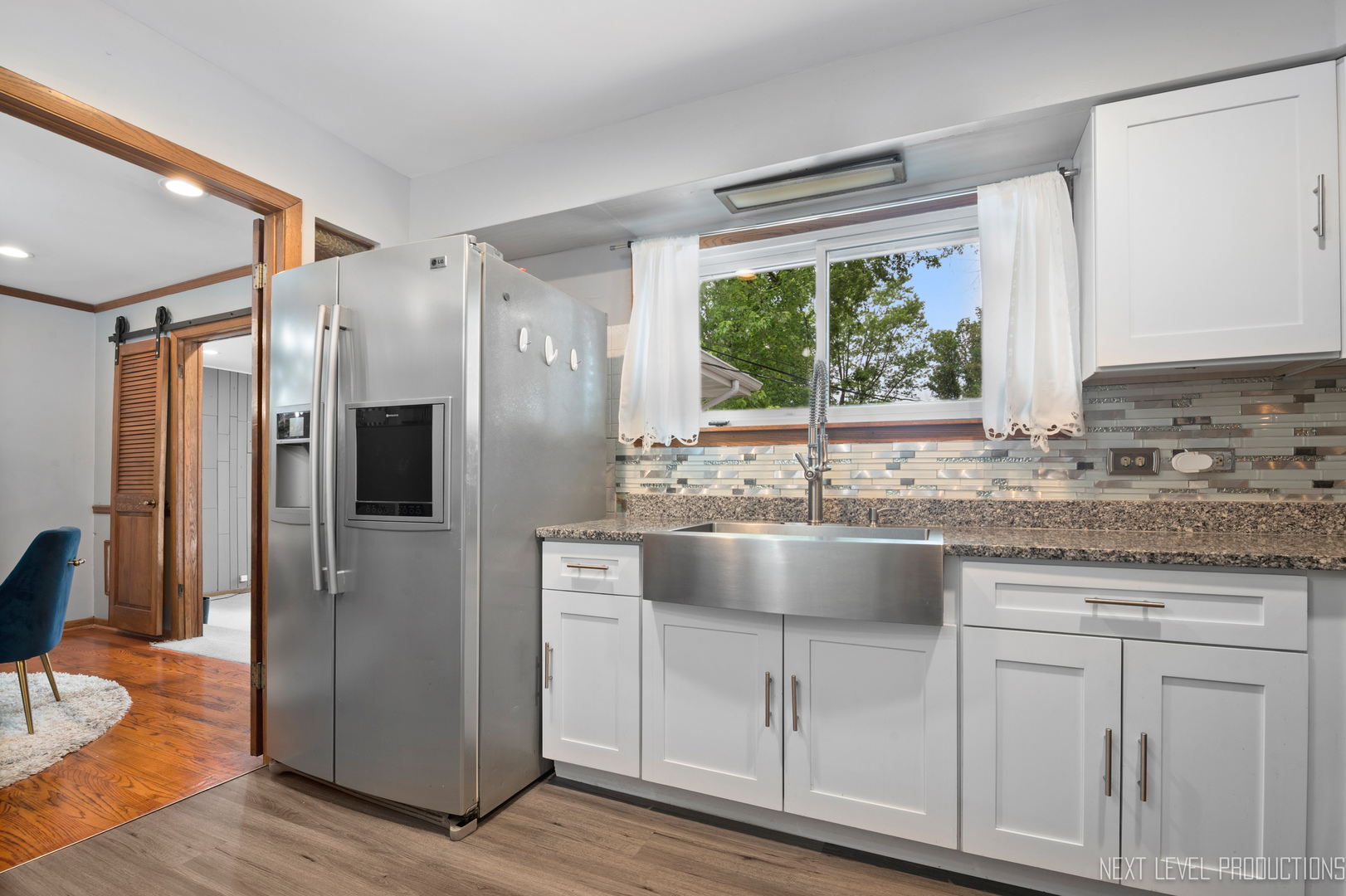 22816 Ridgeway Avenue Richton Park, IL 60471 - Photo 11 of 25 a kitchen with stainless steel appliances granite countertop a refrigerator and a sink