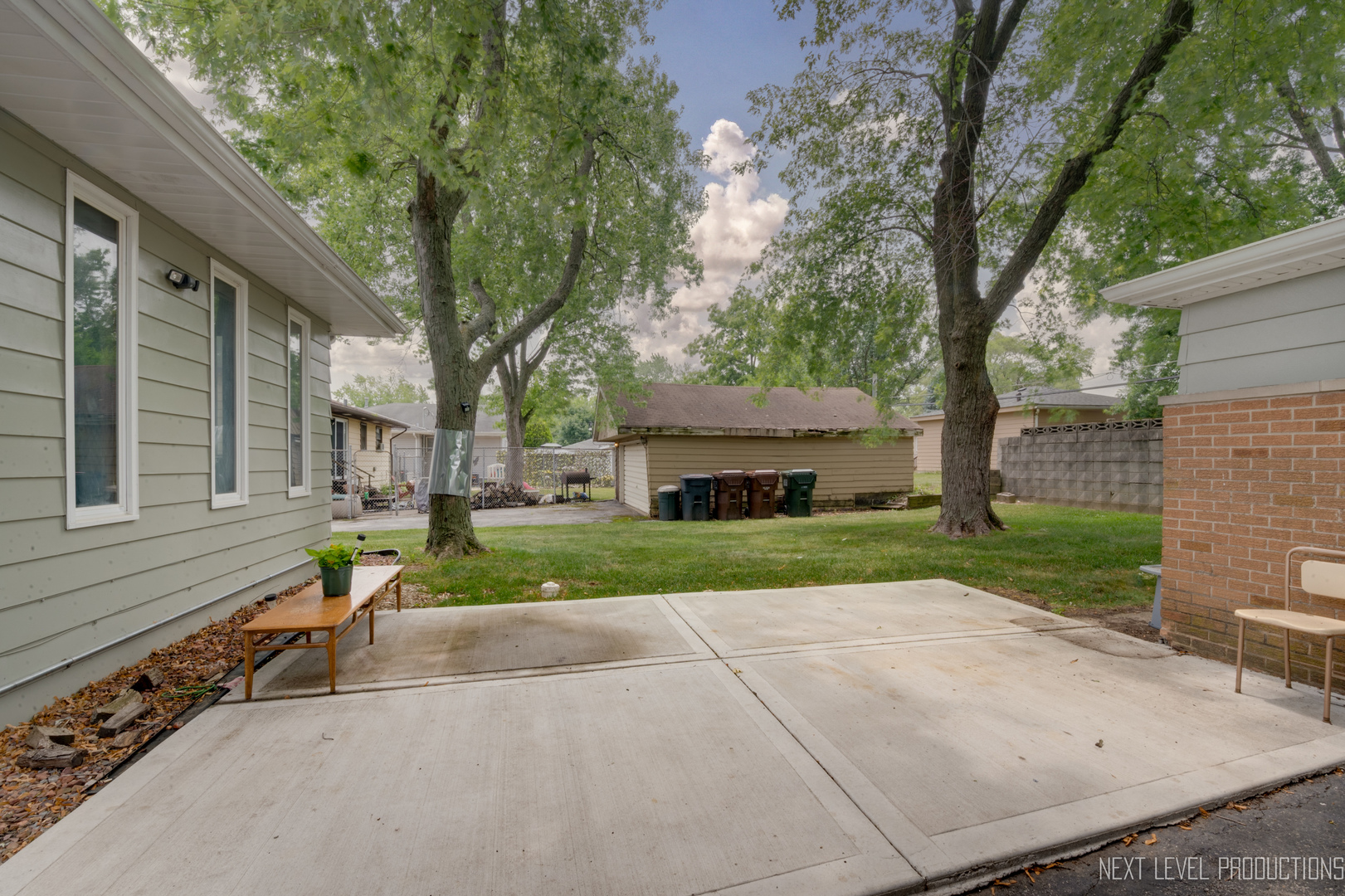 22816 Ridgeway Avenue Richton Park, IL 60471 - Photo 22 of 25 a front view of a house with a yard and trees