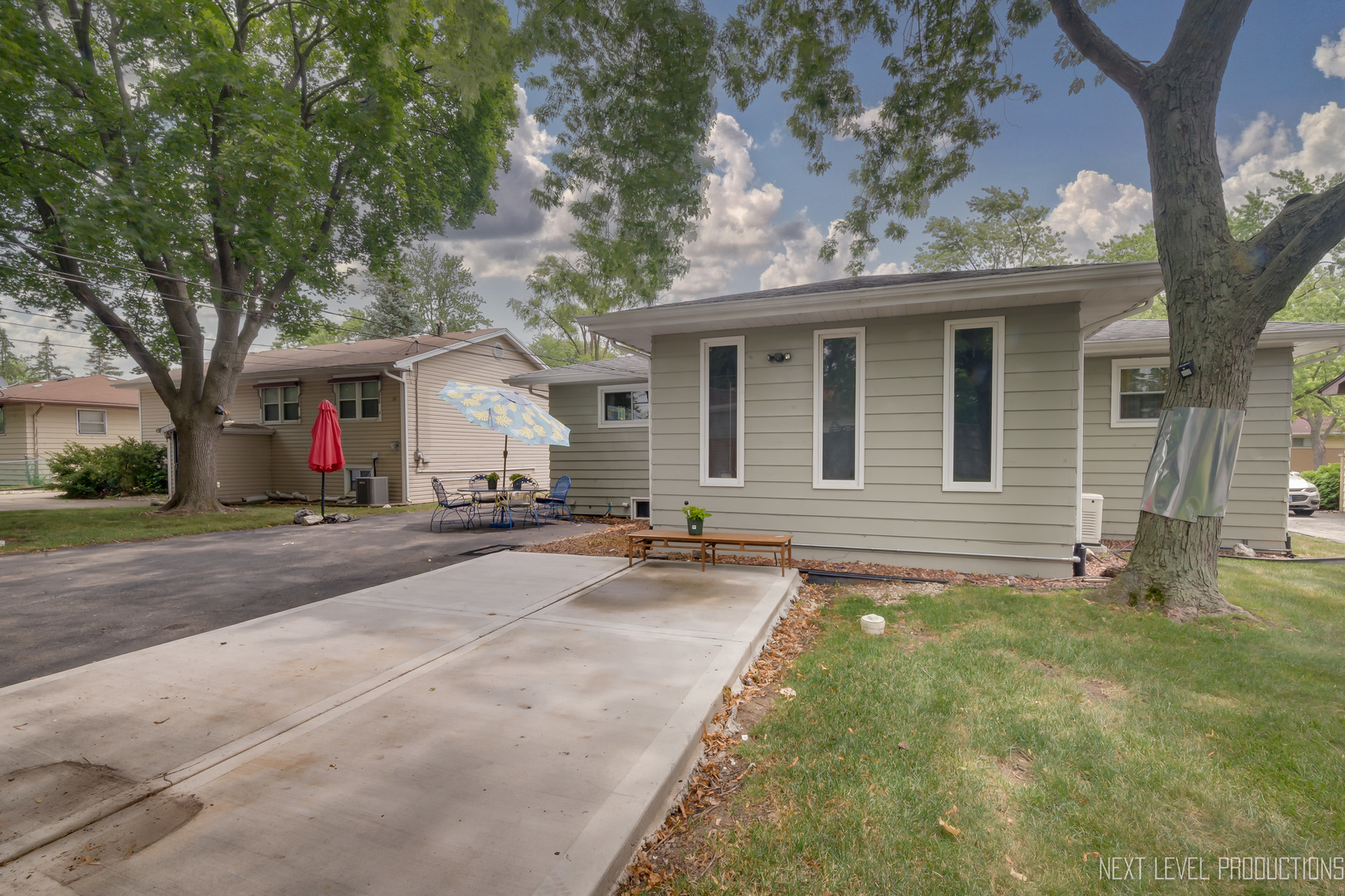22816 Ridgeway Avenue Richton Park, IL 60471 - Photo 23 of 25 a view of a house with yard and a tree