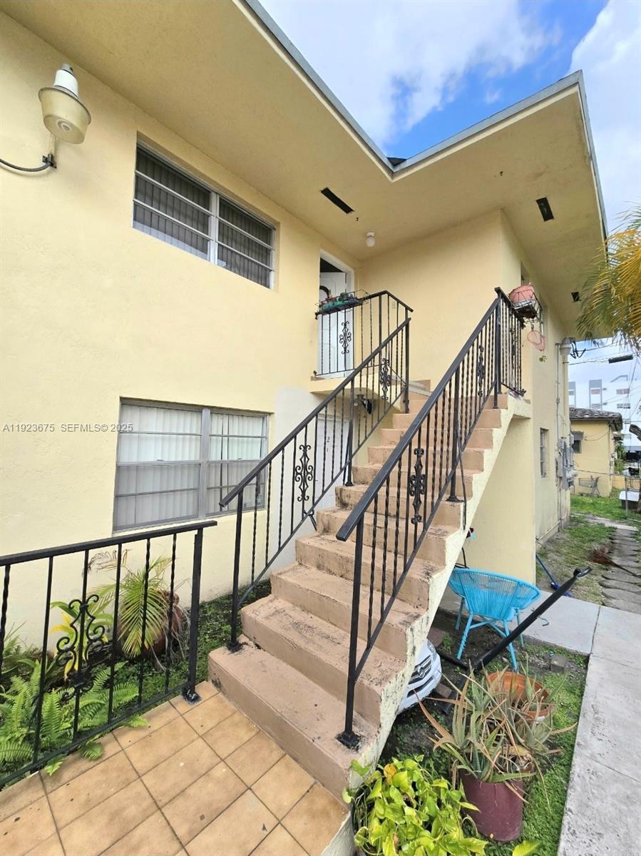 1939 Southwest 5th Street, Unit 4 Miami, FL 33135 - Photo 1 of 13 a view of entryway with wooden floor