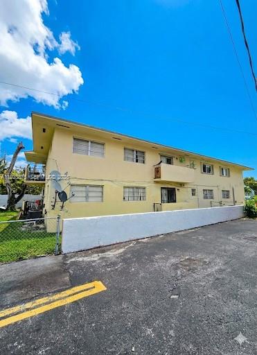 1939 Southwest 5th Street, Unit 4 Miami, FL 33135 - Photo 13 of 13 a view of a big room with a house and a yard