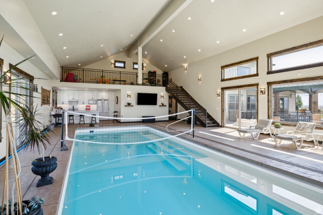6117 North Rocky Ridge Road Peoa, UT 84061 - Photo 18 of 82 Indoor swimming pool with integrated volleyball net