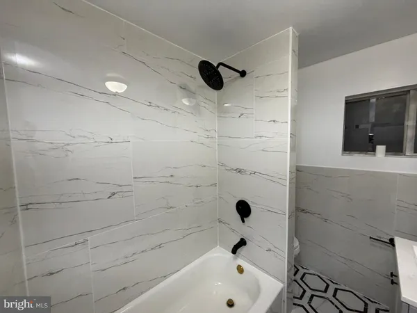 a bathroom with a bathtub