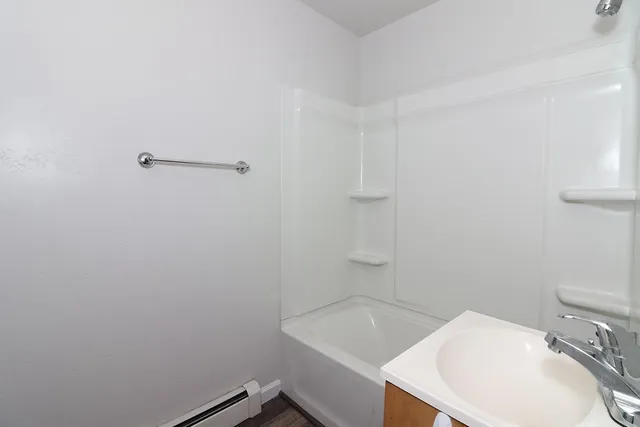 a bathroom with a sink and a bathtub