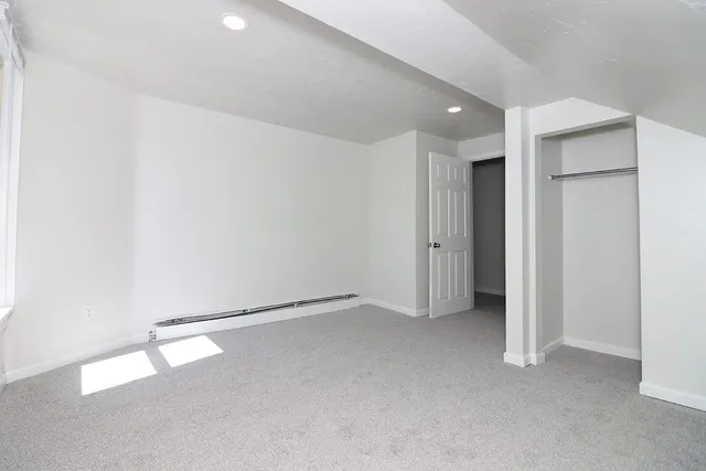 an empty room with a natural light