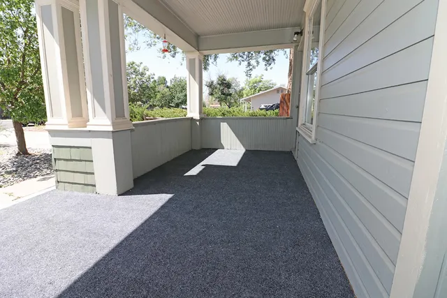 a view of a room with a large window