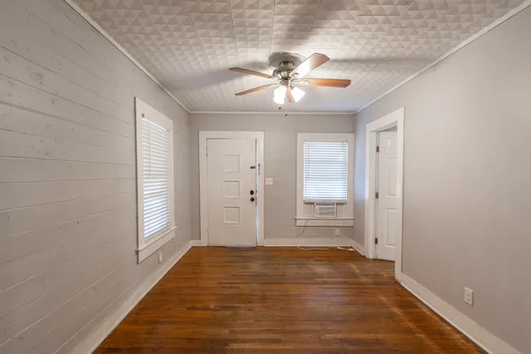 a view of an empty room and window