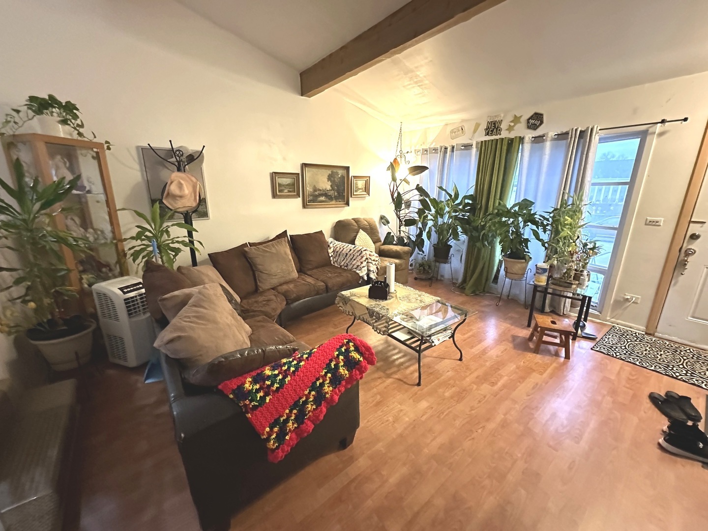 8820 Robin Drive Des Plaines, IL 60016 - Photo 3 of 10 a living room with furniture and wooden floor