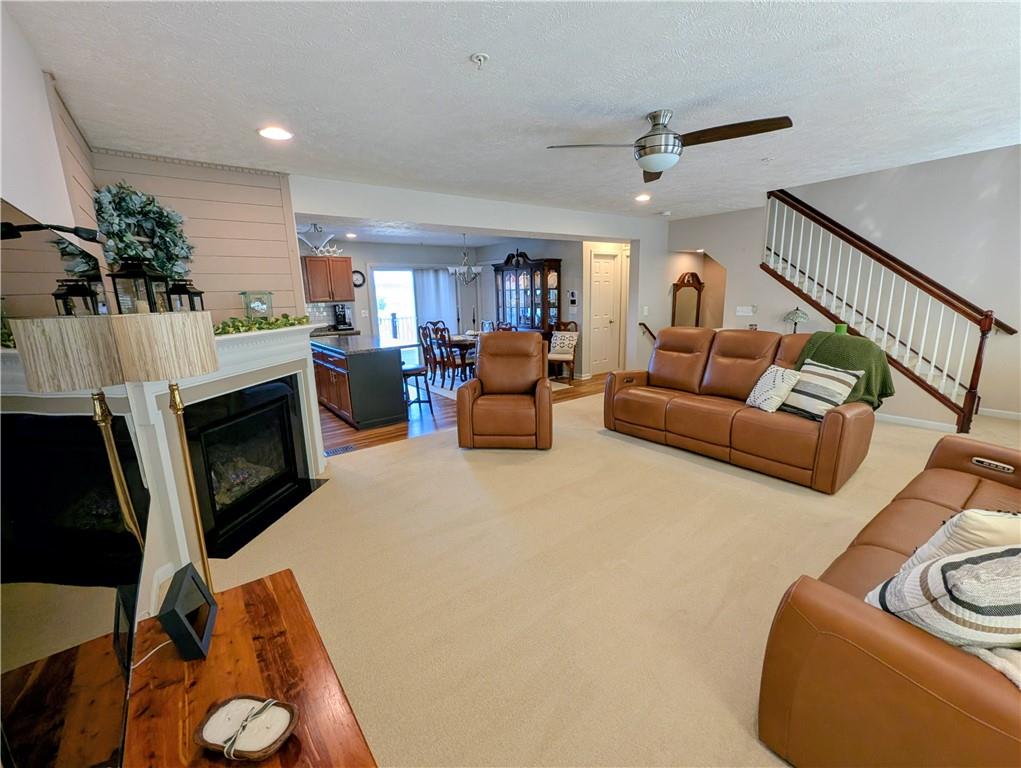 146 Rylie Drive Harmony, PA 16037 - Photo 12 of 43 a living room with furniture and a fireplace