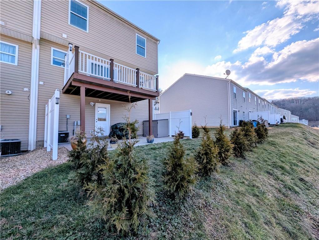 146 Rylie Drive Harmony, PA 16037 - Photo 37 of 43 a front view of a house with a yard and trees