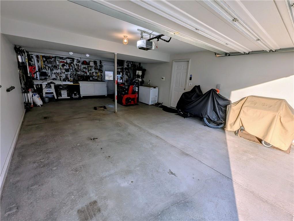 146 Rylie Drive Harmony, PA 16037 - Photo 43 of 43 a view of a garage with rack and bicycle