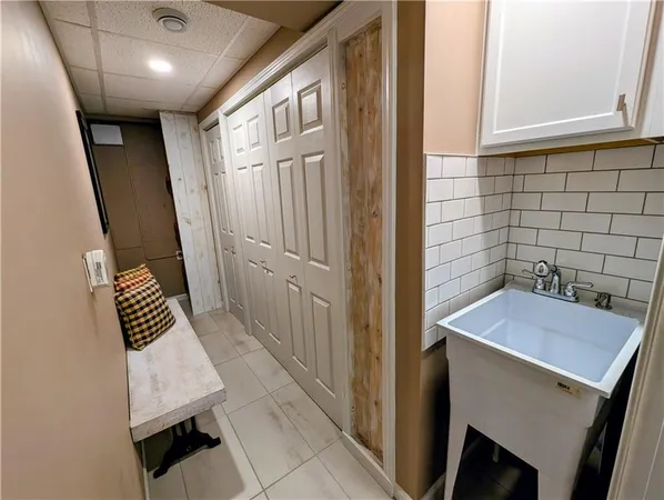 a bed room with furniture and a window