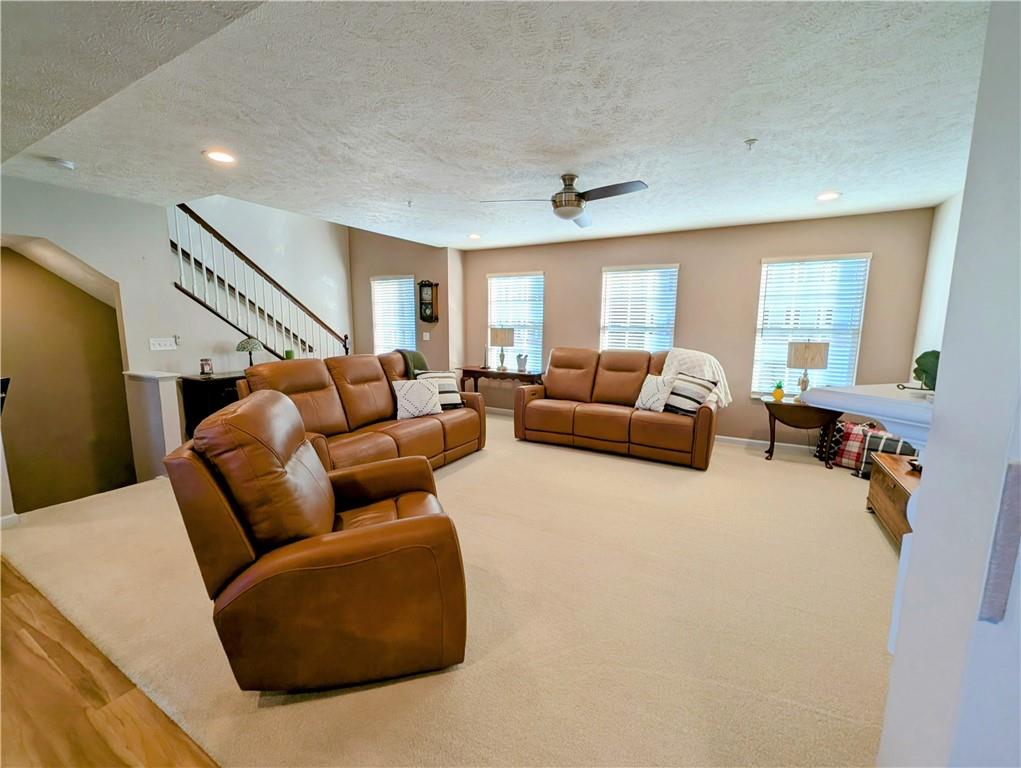 146 Rylie Drive Harmony, PA 16037 - Photo 10 of 43 a living room with furniture and a large window