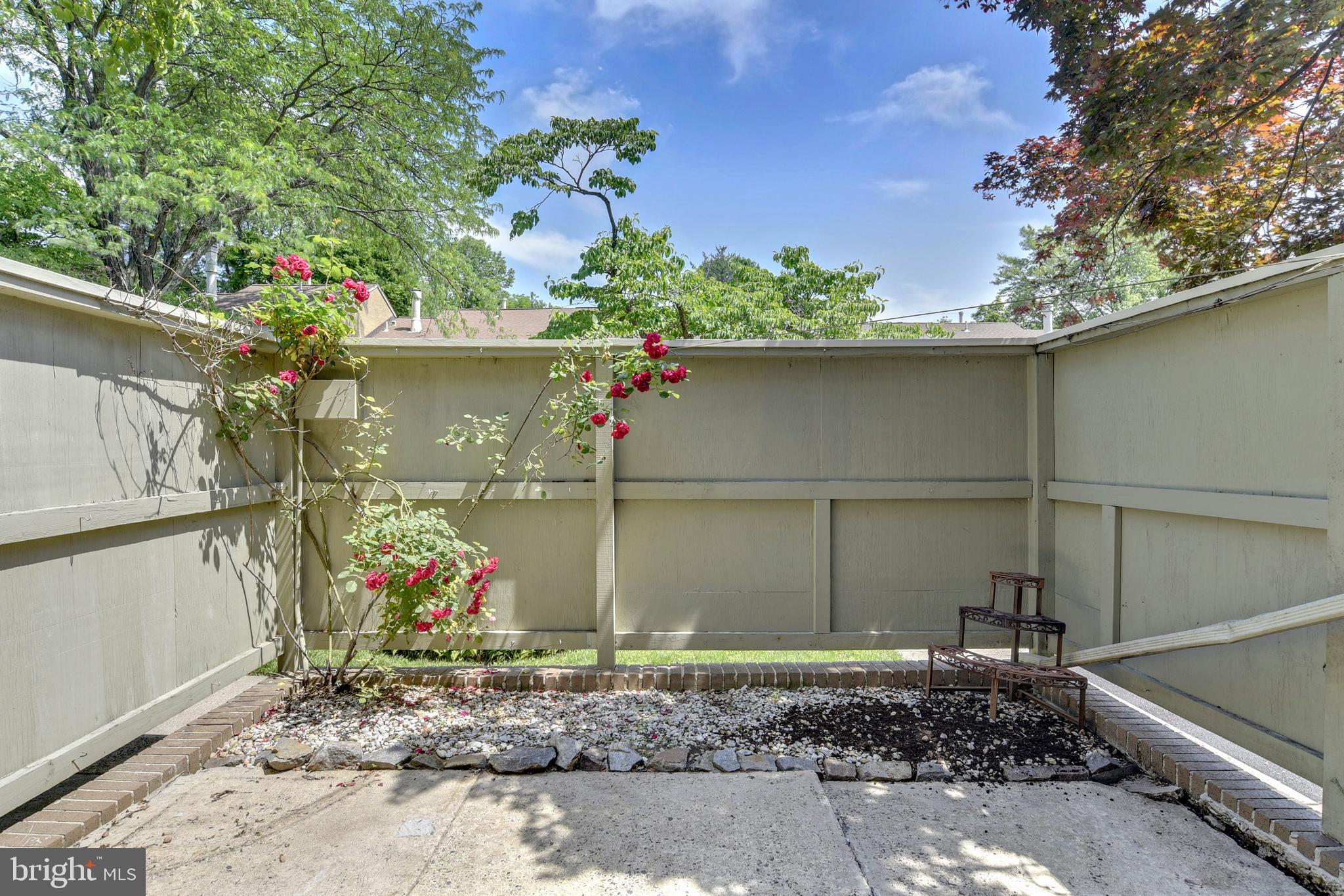 5260 Pooks Hill Road, Unit B8 Bethesda, MD 20814 - Photo 42 of 49 Front Patio view 6 ft. privacy fence