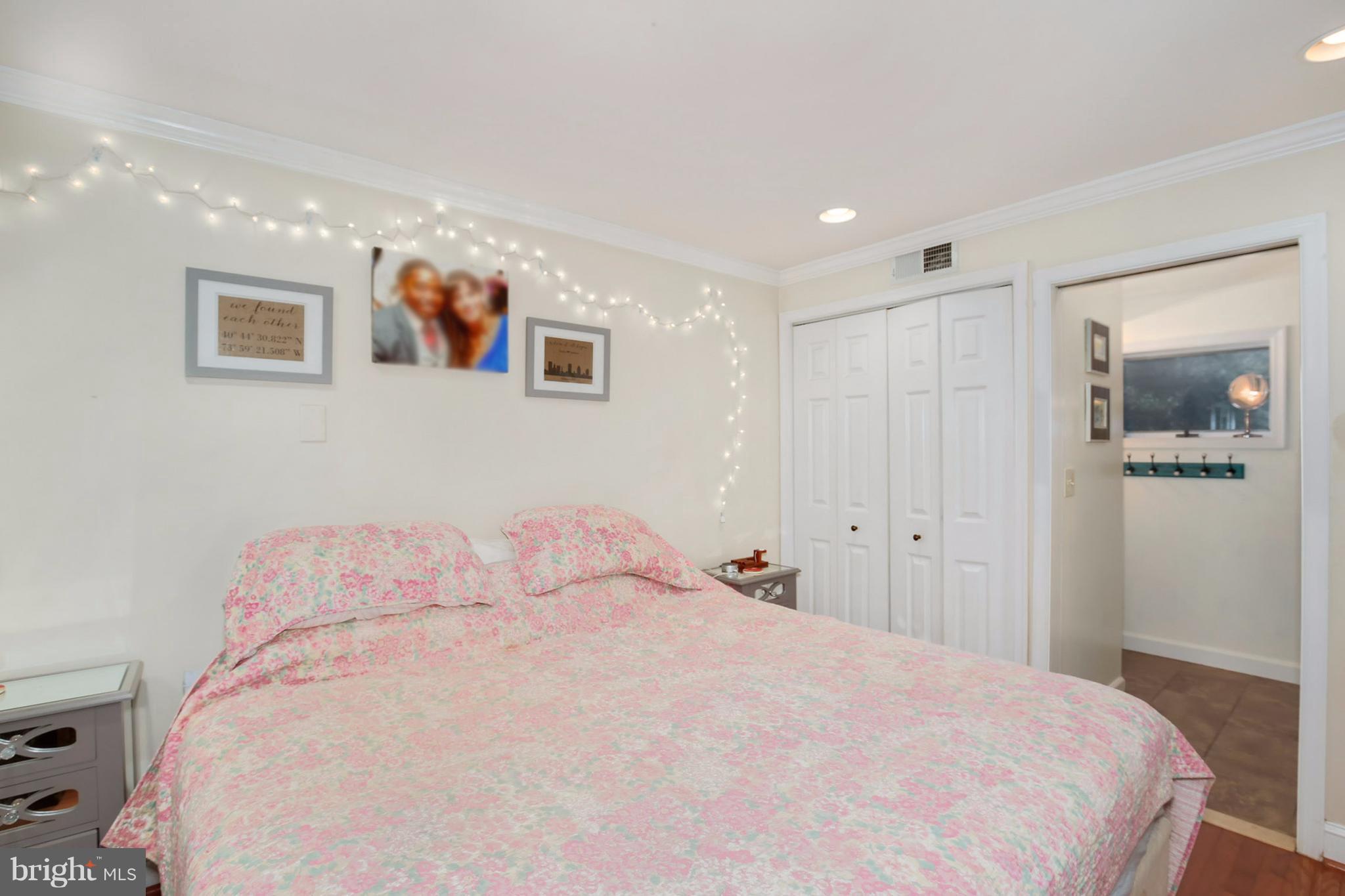 603 Carysbrook Road Baltimore, MD 21208 - Photo 16 of 30 a large white bed in a white room