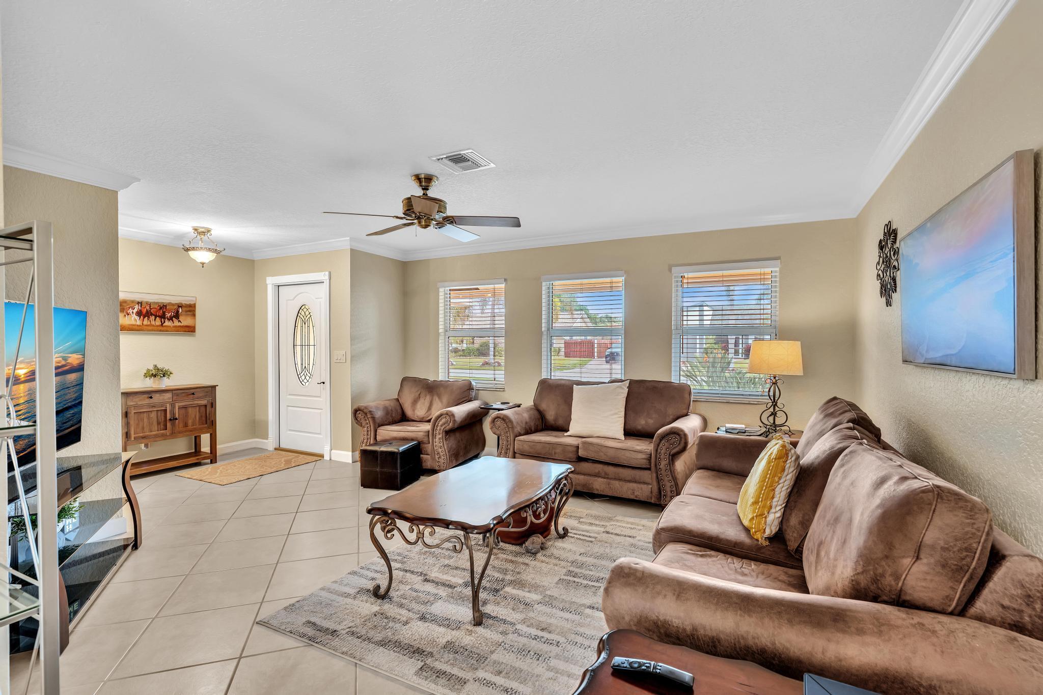 3106 Cormorant Road Delray Beach, FL 33444 - Photo 15 of 45 a living room with furniture and wooden floor