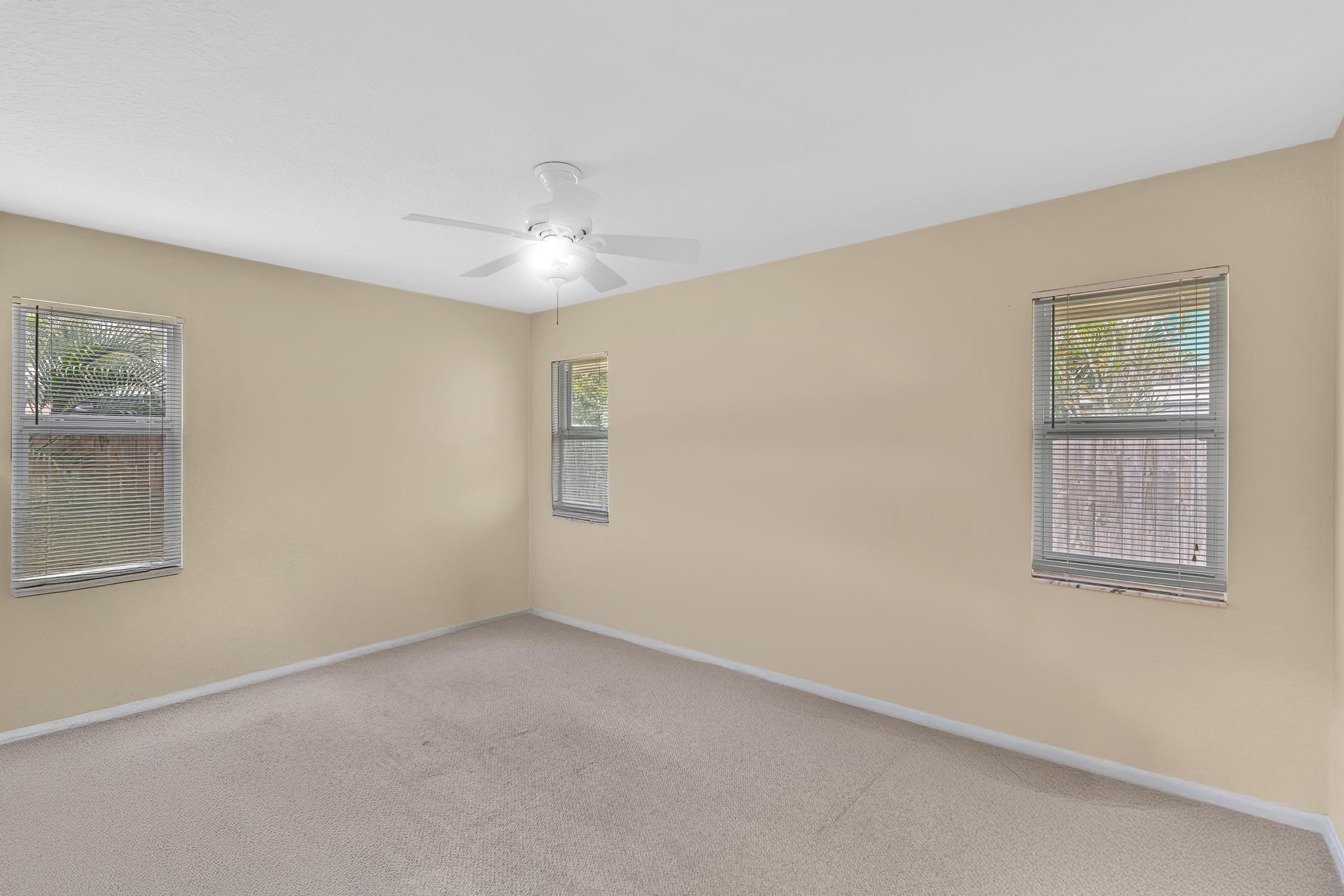 3106 Cormorant Road Delray Beach, FL 33444 - Photo 22 of 45 a view of empty room with windows
