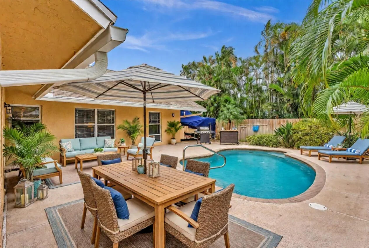 3106 Cormorant Road Delray Beach, FL 33444 - Photo 6 of 45 swimming pool view with a seating space