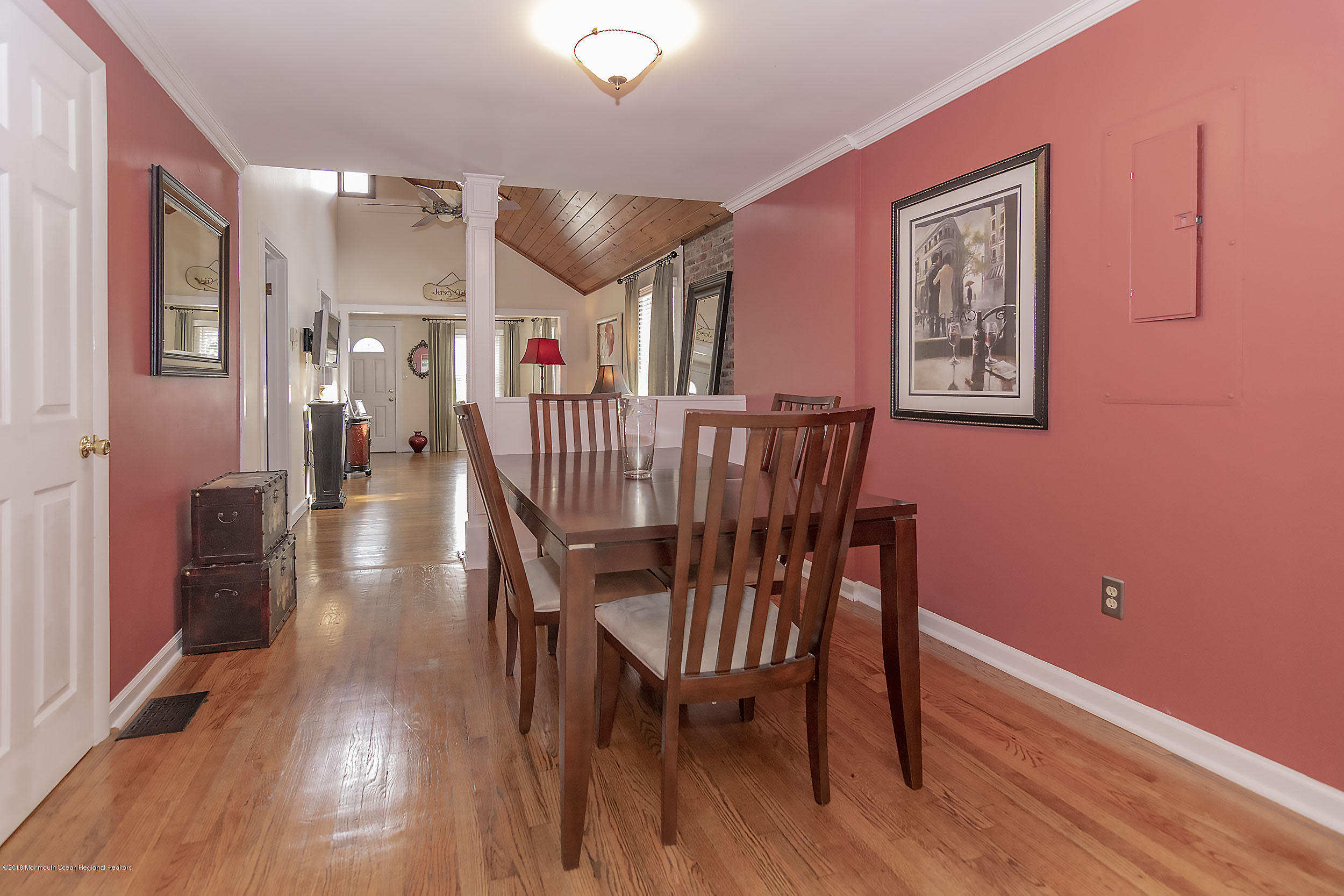 2104 River Road Point Pleasant, NJ 08742 - Photo 13 of 35 a view of a dining room with furniture and wooden floor