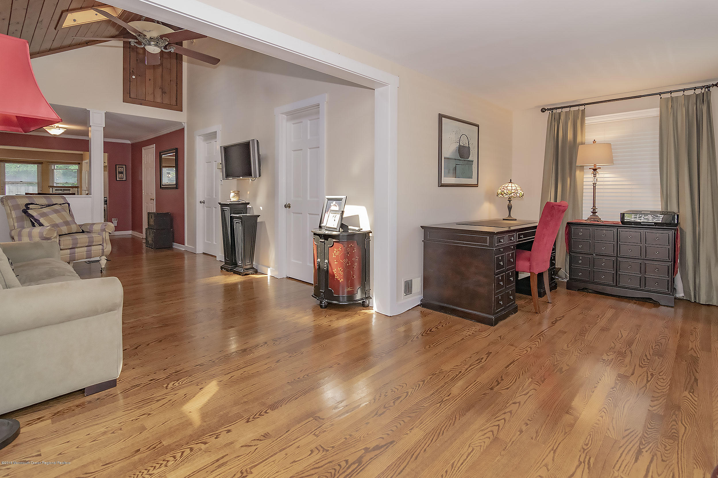 2104 River Road Point Pleasant, NJ 08742 - Photo 17 of 35 a living room with furniture and a fireplace